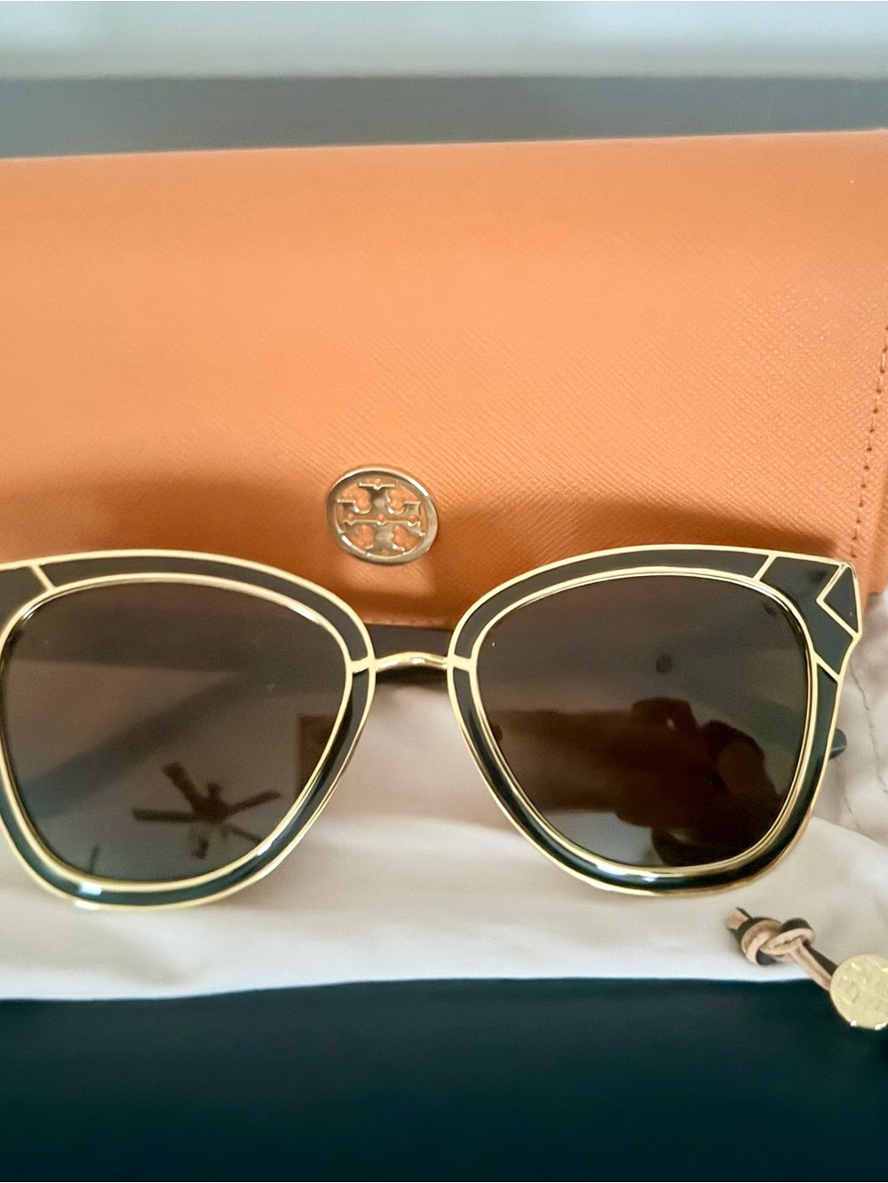 Tory Burch Black and Gold Rounded Cat-Eye Sunglasses